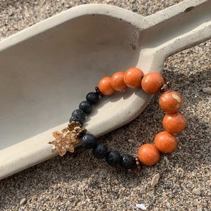 Black & Orange Lava Bead Bracelet with Charm